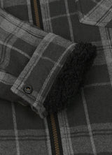 Detailed view of the cuff of haze black men's sherpa-lined cozy flannel hoodie