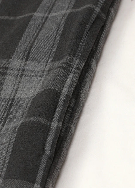 Close-up of the seam pocket of haze black men's sherpa-lined zipper shirt jacket