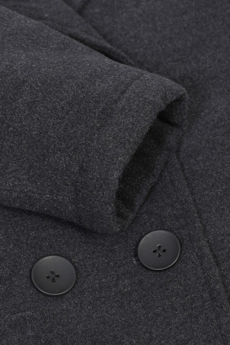 Detailed view of grey boy's wool peacoat cuff