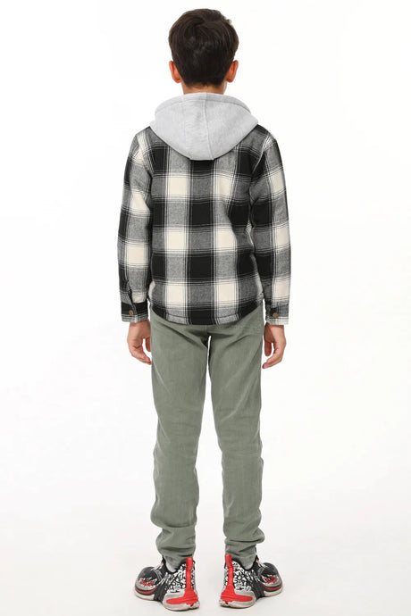 Back view of boy wearing a black white hooded plaid flannel jacket