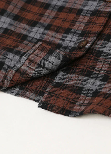 Detailed view of kids flannel plaid shirt with shirttail hemline