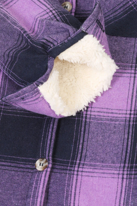 Zoomed-in view of the interior cuffs on a girls purple flannel jacket