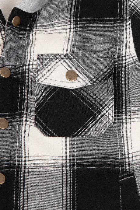 Detail view of kids midnight black flannel jacket pocket with button