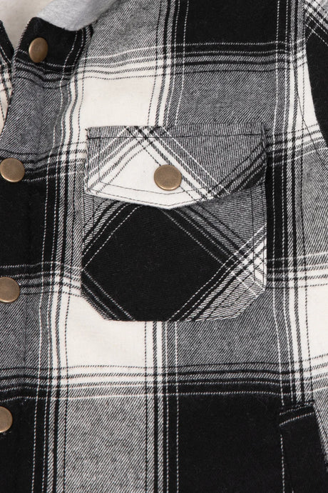 Detail view of kids midnight black flannel jacket pocket with button