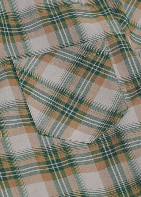 Detailed close-up of chest pocket on kids plaid summer short sleeve shirt