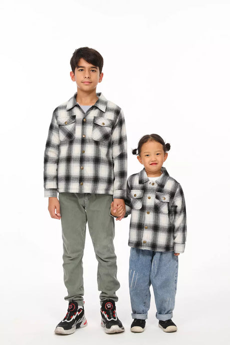 Two children in midnight snowfall toddler sherpa lined flannel plaid shacket