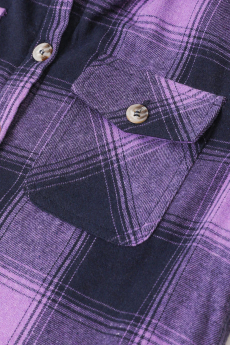 Zoomed-in view of hood on a girls purple flannel shirt jacket 