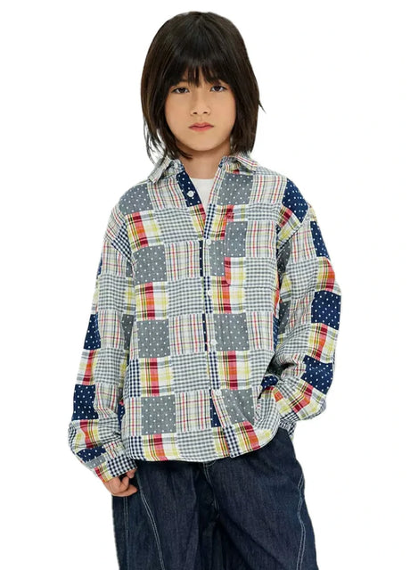 Boy wearing a country meadow pathwork flannel shirt with curved hem