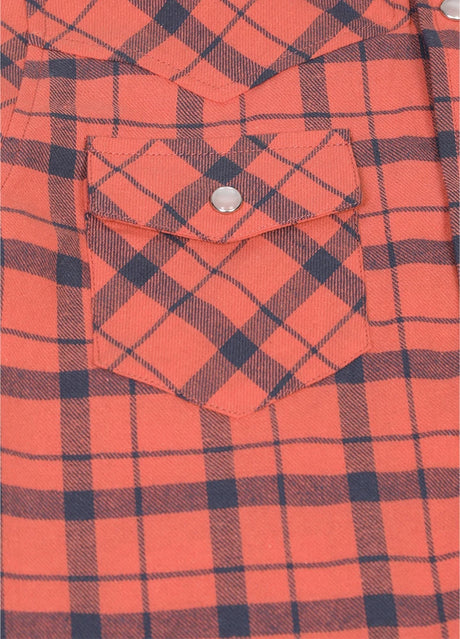 Detail of kid's long-sleeve western shirt pocket with button