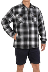 A man with one hand in the pocket in a black white full zip up plaid shirt jacket for men