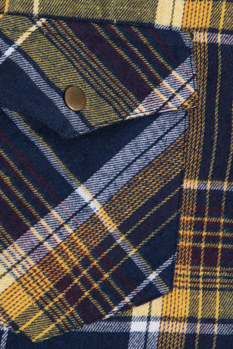 Close-up of the pocket of electric navy men's long sleeve plaid western flannel shirt