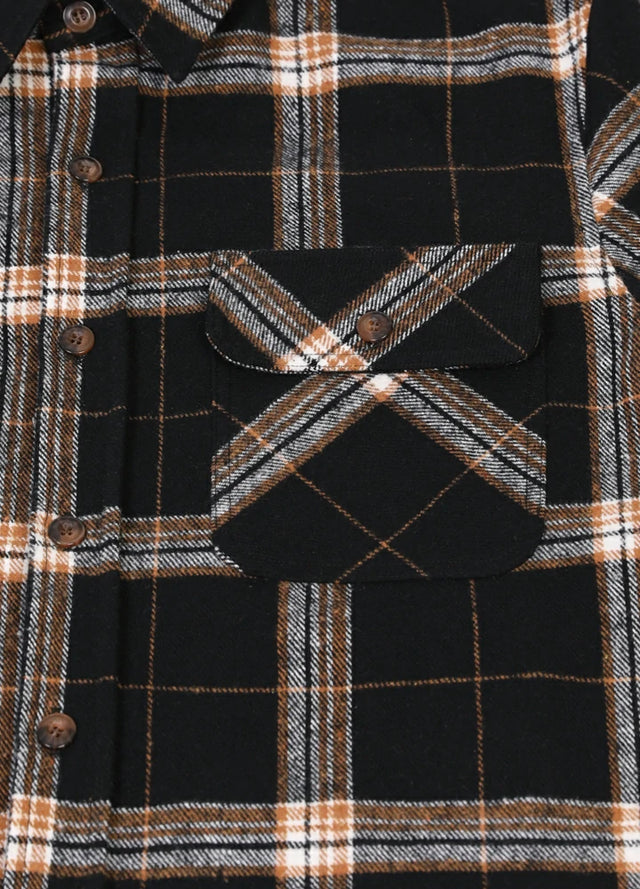 Close-up of the pocket of dark chocolate men's heavyweight flannel plaid shirt