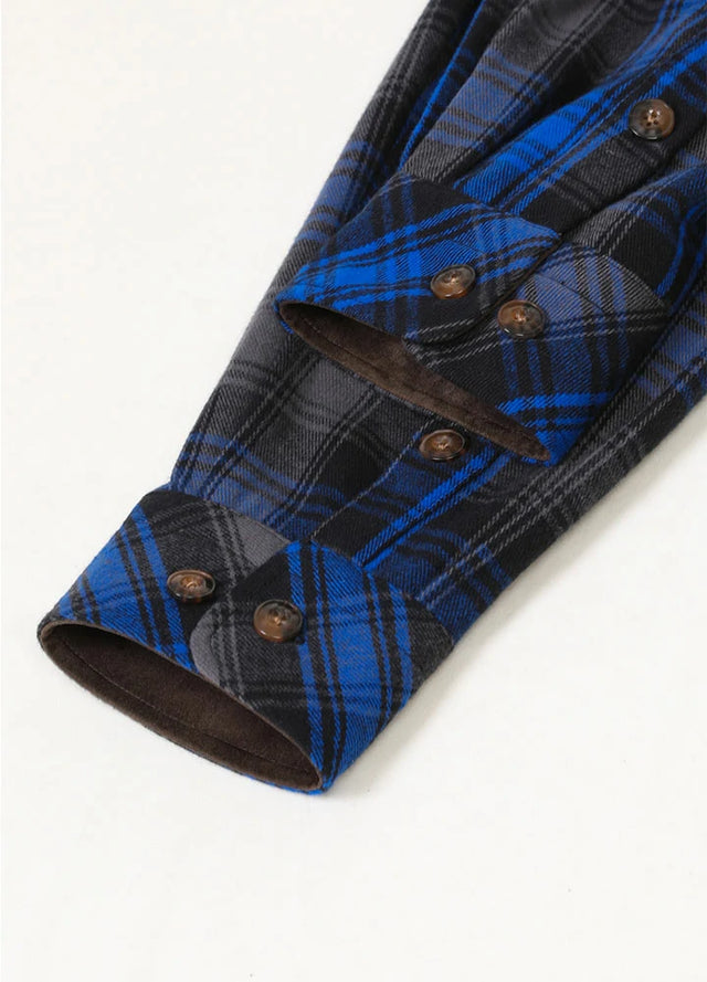 Close-up of the cuff of sky slate men's warm rugged ridge outdoor flannel shirt