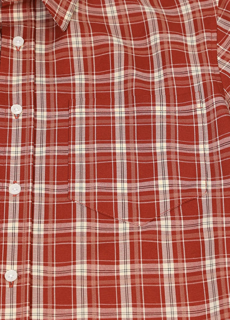 Close-up of the pocket of rust red men's button front lightweight plaid short sleeve shirt