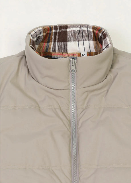 Close-up of the collar of the light gray men's zipper flannel lined puffer vest