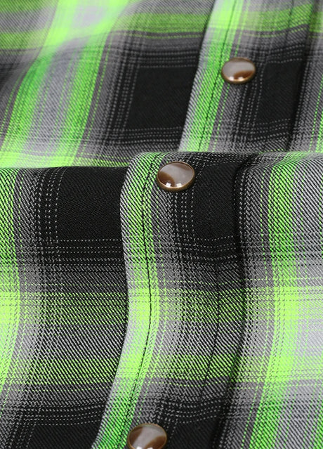 Close-up of the snap button of neon green men's western plaid vest