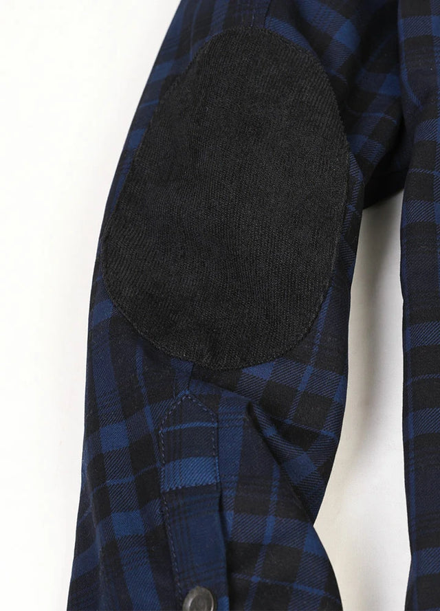 Detailed view of the elbow of indigo men's cozy water repellent flannel shacket