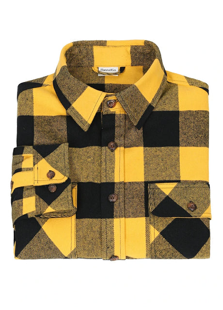 A high view of a folded yellow black men's stalwart heavyweight cotton plaid shirt