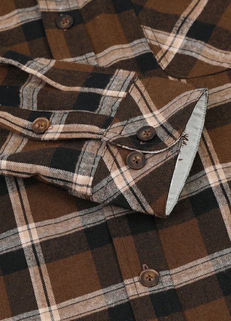 Close-up of the cuff of mocha men's wildlife adventure button flannel hoodie