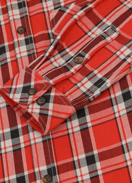 Close-up of the cuff of watermelon red men's free swingin' flannel plaid cotton shirt