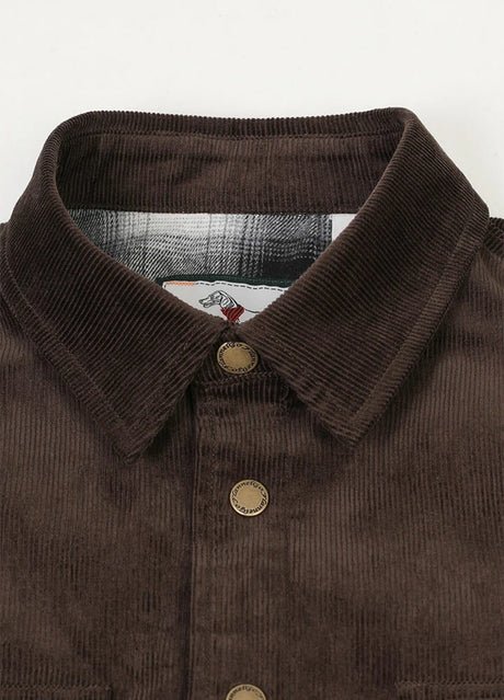 Zoomed-in view of men's chocolate corduroy shirt jacket with collar