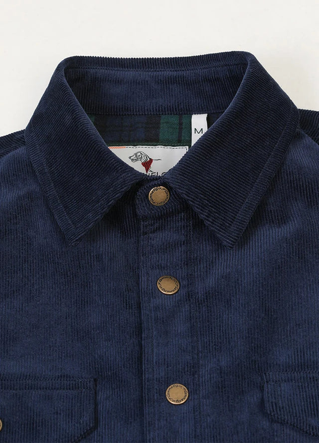 Detailed view of navy flannel lined corduroy shirt jacket with cozy collar