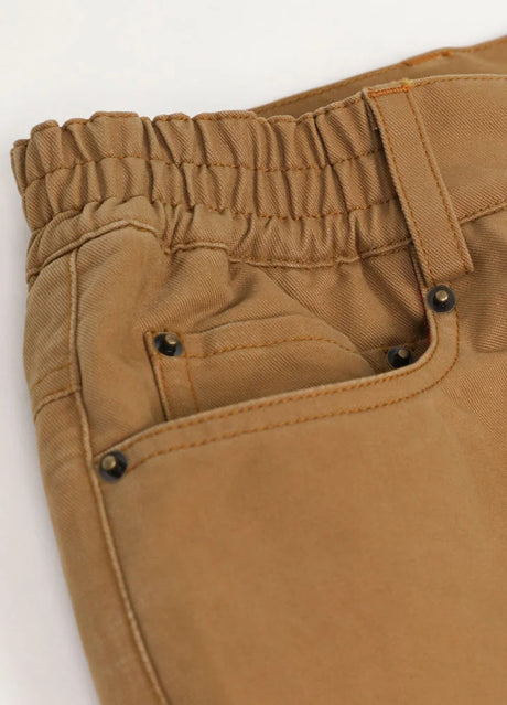 Close up of the pocket of khaki men's pants with flannel lining