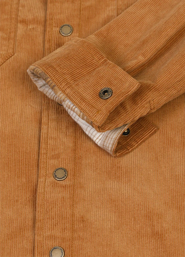 Detailed view of men's corduroy shirt jacket with adjustable cuffs