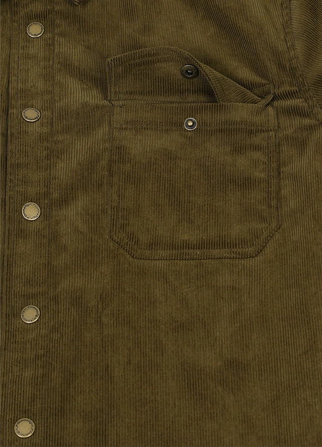 Close-up of men's corduroy flannel lined shirt jacket with snap-stud chest pocket