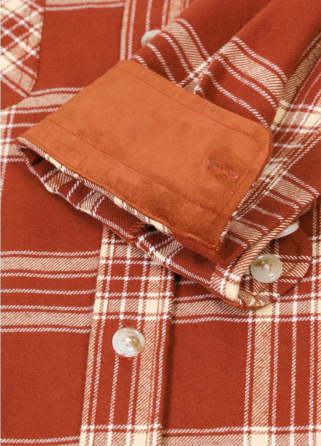 Detailed view of cuff of rust red men's warm rugged ridge outdoor flannel shirt