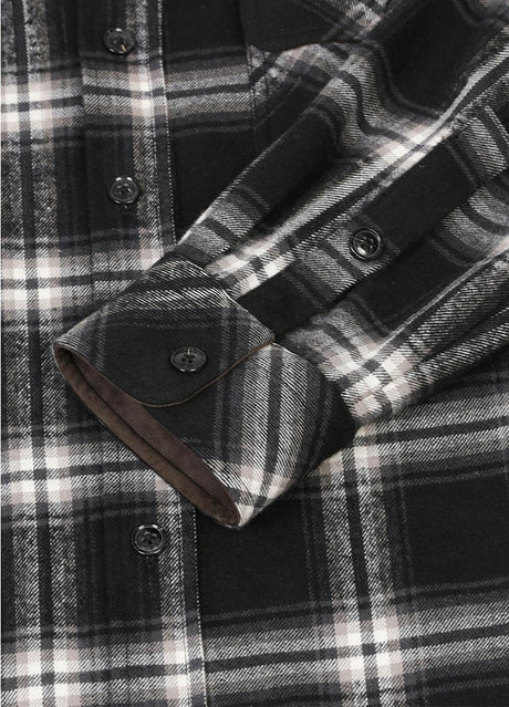 Detailed view of the cuff of classic noir men's warm rugged ridge outdoor flannel shirt