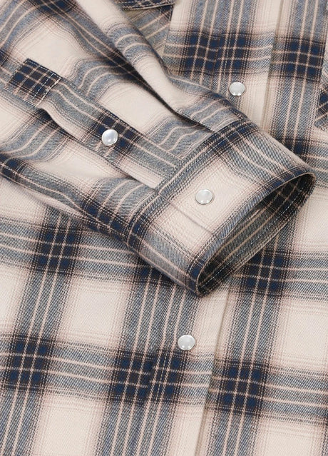 Close-up of the cuff of sandy azure men's plaid outdoor long sleeve western shirt