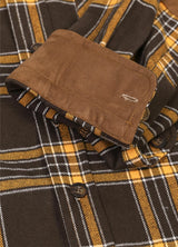 Close-up of the cuff of autumn gold men's warm rugged ridge outdoor flannel shirt