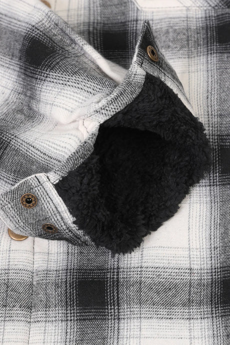 Detailed view of the cuff of midnight snowfall men's thick flannel cotton jakcet with sherpa lining 