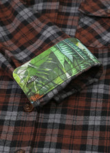 Kids wildlife adventure flannel plaid shirt cuffs with wildlife pattern detail