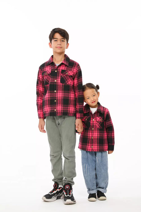 Brother and sister in pink flannel shackets