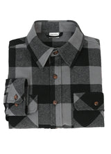 A high view of a folded gray men's stalwart heavyweight cotton plaid shirt