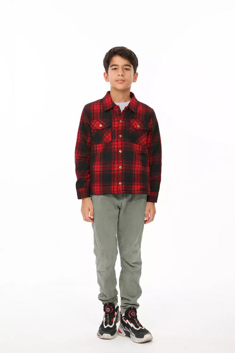 A boy in red flannel shacket