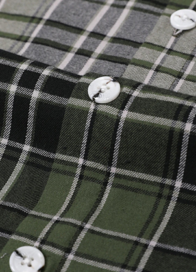 Detail of kids short sleeve flannel shirt with buttons