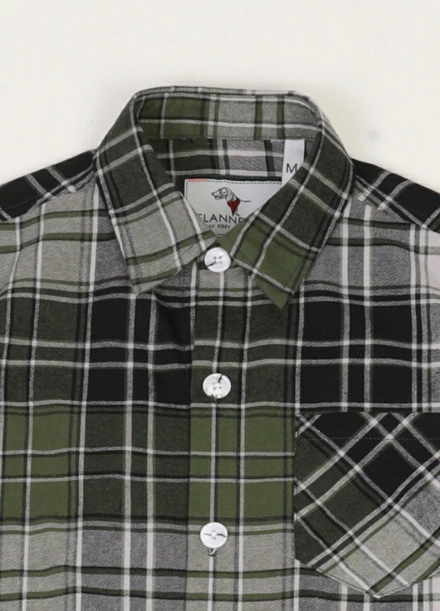 Zoomed-in view of the buttoned front closure on a kids short sleeve cotton shirt