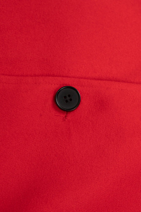 Detail of button-down design on kids red reversible hooded wool blend cape