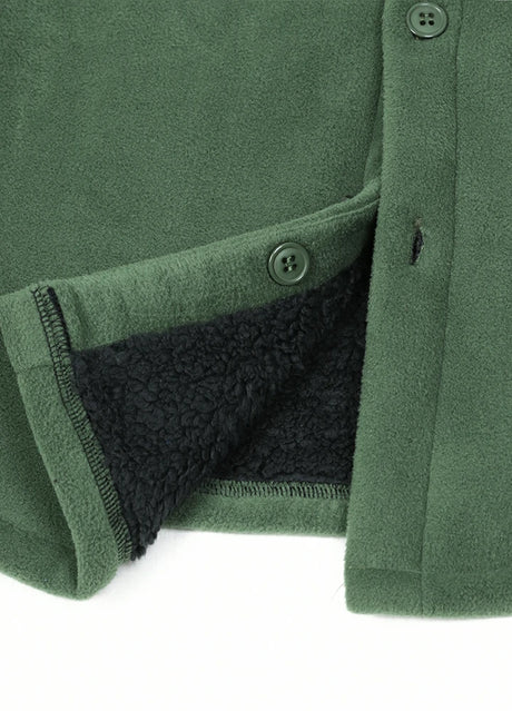 Close-up of the hem of the lark green men's button sherpa lined shirt jacket