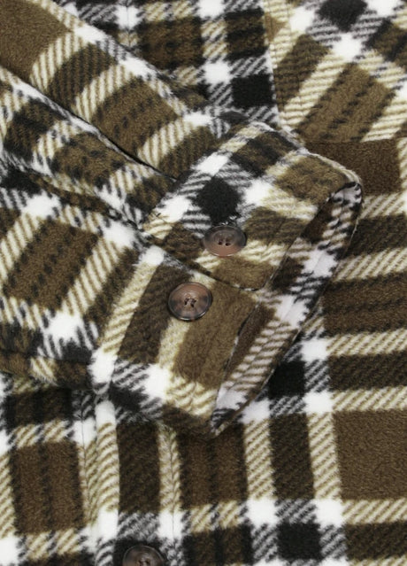 Close-up of the cuff of brown white men's sherpa lined shirt jacket with button closure