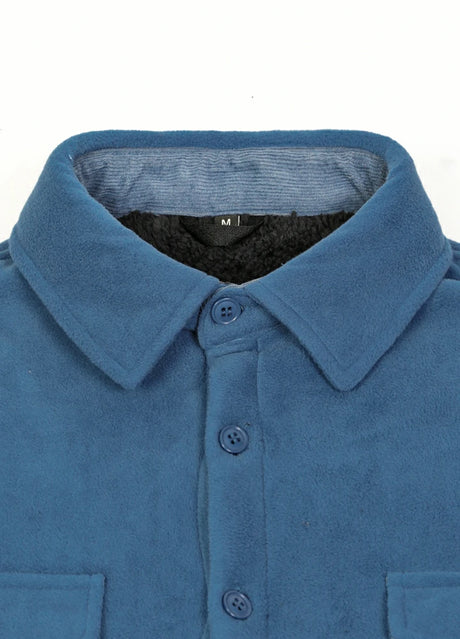 Close-up of the lapel of light blue men's cozy fleece shirt jacket with sherpa lining 