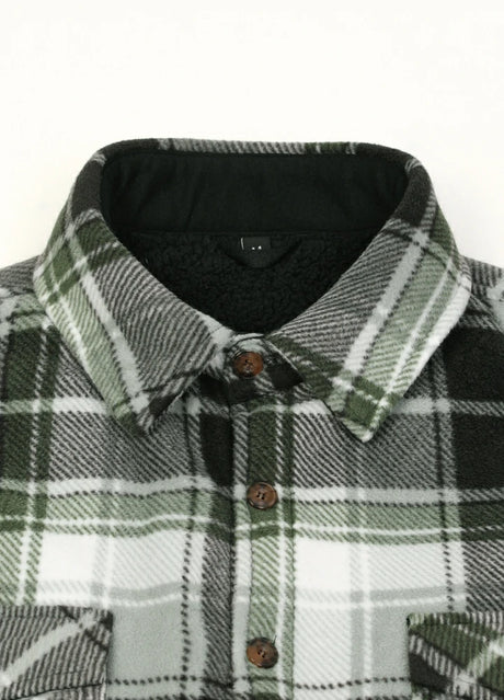 Close-up of the lapel of midnight dawn men's button plaid shirt jacket with sherpa lining