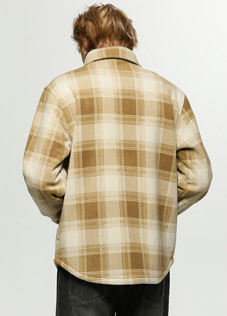 Back view of a man in a desert ivory sherpa lined plaid jacket for men