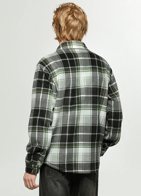 Back view of a man in a midnight dawn sherpa lined plaid jacket for men