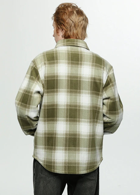 Back view of a man in a misty woodland sherpa lined plaid jacket for men