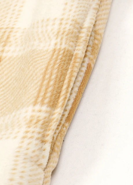 Close-up of the seam pocket of desert ivory sherpa lined plaid shacket for men