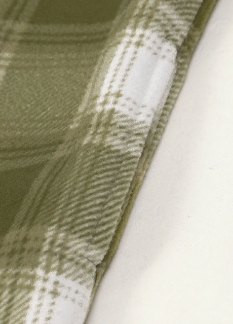 Close-up of the seam pocket of misty woodland sherpa lined plaid shacket for men